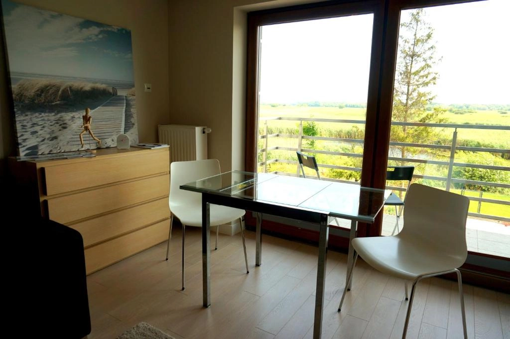 Shared dining area with countryside view